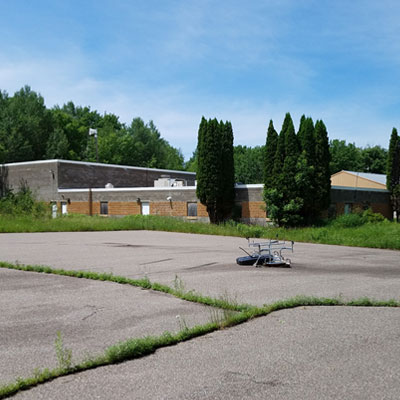 Purchased by Band for Tribal College and now vacant